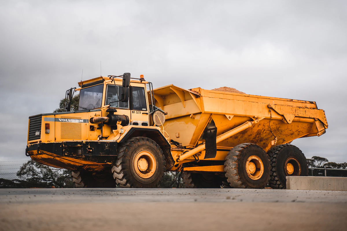 Dump truck loaded with crushed limestone for Forney TX driveway job